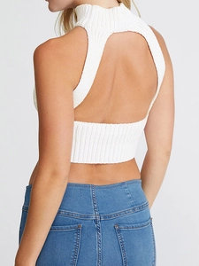 Slim fit white knitted halter neck crop top featuring a sexy open back design
