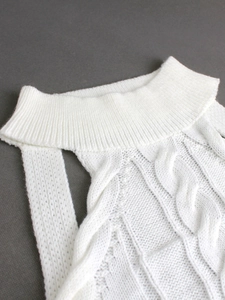 Sleeveless white cable knit high neck vest for women with ribbed details and slim fit