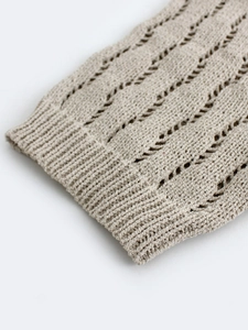 Gilet court en tricot à nouer avec motif ajouré en losange et poignets côtelés