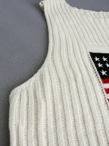 Women's cream knit sweater vest featuring US flag stars and stripes pattern design