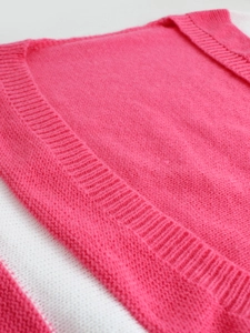 Women's long sleeve horizontal striped knit cardigan in vibrant rose red and white