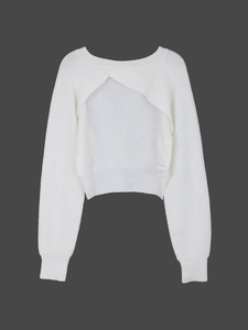 Detail of white long-sleeved knitted sweater featuring a crisscross cutout back design