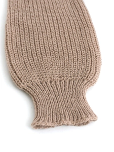 Light brown ribbed knit texture of a long-sleeved cardigan sweater for autumn wear