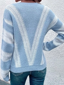 Slim fit light blue crew neck knit sweater with white V-shaped pattern on the back