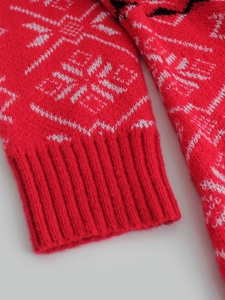 Robe en tricot rouge avec motifs flocons de neige blancs et poignets côtelés