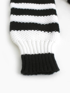 Classic black and white striped knit cardigan with ribbed cuffs and textured soft fabric