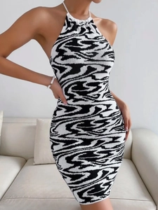 Halter neck knit dress with zebra print pattern in a slim fit bodycon style