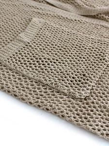 Women's mid-length long-sleeve crochet cardigan featuring a beige hollow-out mesh knit