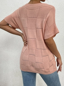 Women's pink knit short sleeve top with checkerboard texture and hollow-out details