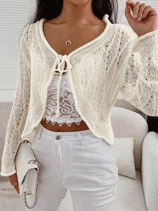 White crochet knit tie-front cardigan sweater with long sleeves and hollow-out texture