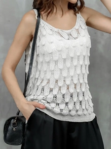 Chic white crochet knit sleeveless top with hollow leaf patterns and round neckline