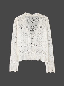 Gilet en maille crochetée blanche à manches longues avec motifs ajourés