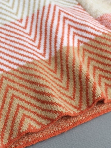 Short sleeve knit cardigan with zigzag pattern in orange white and beige colors