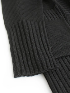 Classic black knitted cardigan with premium ribbed cuffs and high-quality weave texture