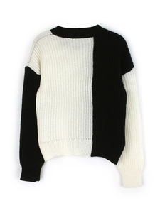 Women's crew neck long sleeve sweater featuring classic black and white color block design