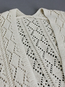 Elegant beige knit cardigan with diamond pointelle hollow design for beach vacations