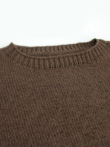 Brown crewneck knitted vest with textured vertical ribbing and chunky knit details