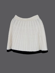 Cream white cable knit mini skirt with contrasting black hem and elastic waist