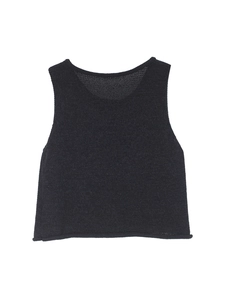 Detail of minimalist black knit tank top showing high-quality fine stitching and crew neck