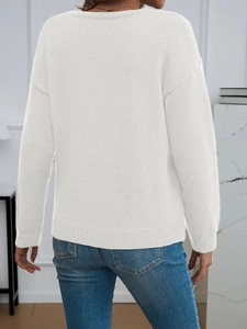 Back view of a loose-fit white knitted sweater with ribbed texture and drop shoulder design
