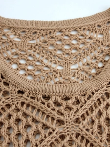 Women's knit hollow-out vest with ribbed crew neck in warm camel for seaside vacations