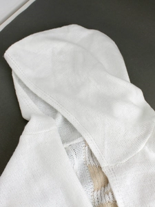 White knitted long-sleeve hooded jacket with fine ribbed texture for women in autumn