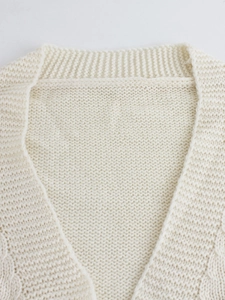 Chunky knit V-neck bear cardigan in cream white with ribbed details and high texture
