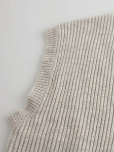 Women V-neck sleeveless oatmeal rib knit vest cardigan featuring button-down details