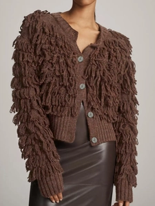 Women's dark brown chunky knit cardigan with fringe tassels and grey textured buttons