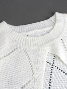 White knit sweater with round neck and elegant pointelle hollow pattern for women