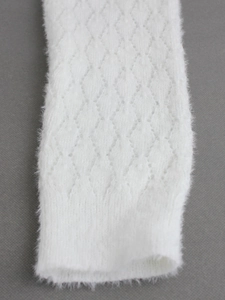 White pointelle knit leg warmers with diamond hollow pattern and ribbed cuffs for women
