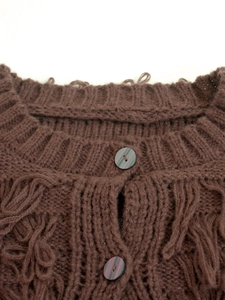 Women's dark brown chunky knit cardigan sweater with fringe texture and buttons