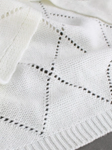 Short sleeve white pointelle knit sweater with classic ribbed hem and diamond texture