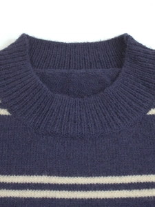 Women's crewneck striped sweater in navy and white with soft ribbed knit texture