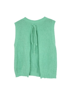 Detail of mint green knit vest featuring open back design with adjustable ribbon tie
