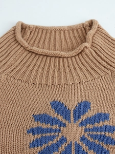 Chic camel knit pullover for women featuring a blue floral pattern and ribbed crew neck