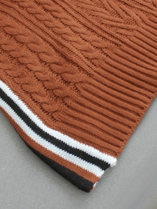 Caramel cable knit turtleneck sweater with vintage striped ribbing details