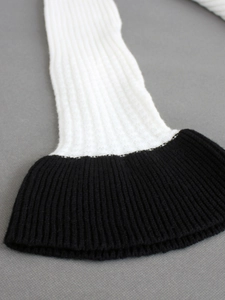 Women's square neck sweater featuring knit ribbed sleeves with black flared contrast cuffs
