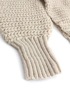 Beige crew neck knit sweater with textured V-pattern and ribbed cuffs for women