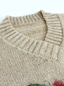 Women's V-neck long sleeve knit sweater with ribbed neckline in soft beige oatmeal