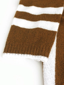 Women's long sleeve bohemian striped knit sweater with textured brown and white cuffs