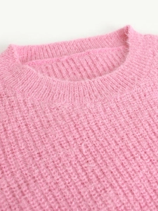 Pink crewneck knit sweater for women featuring a soft mohair-like fuzzy texture finish