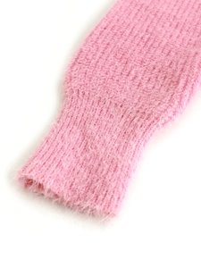 Women's pink knit sweater featuring plush mohair texture and ribbed long sleeve cuffs