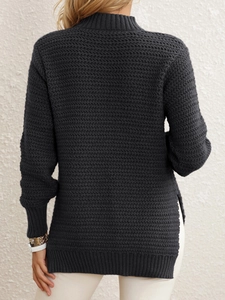 Detailed back view of charcoal grey knit sweater with side slits and textured V-pattern