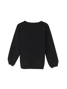 Women's slim fit black knit sweater with crew neck and ribbed cuffs on white background