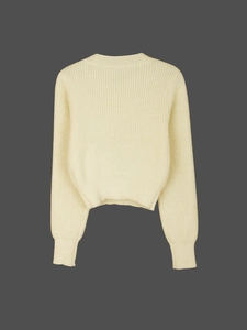 Detail view of the cream knitted sweater back featuring thick ribbed hem and shoulder texture