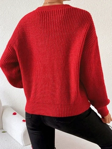 Women's red chunky knit sweater with ribbed texture in a cropped loose fit style