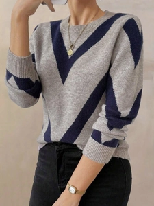 Women's knit pullover sweater with gray and dark blue geometric chevron patterns