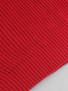 Vibrant red rib-knit cropped pullover sweater with detailed heart pattern texture