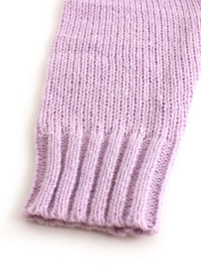 Close-up detail of the ribbed cuffs on this lavender purple knit sweater for women